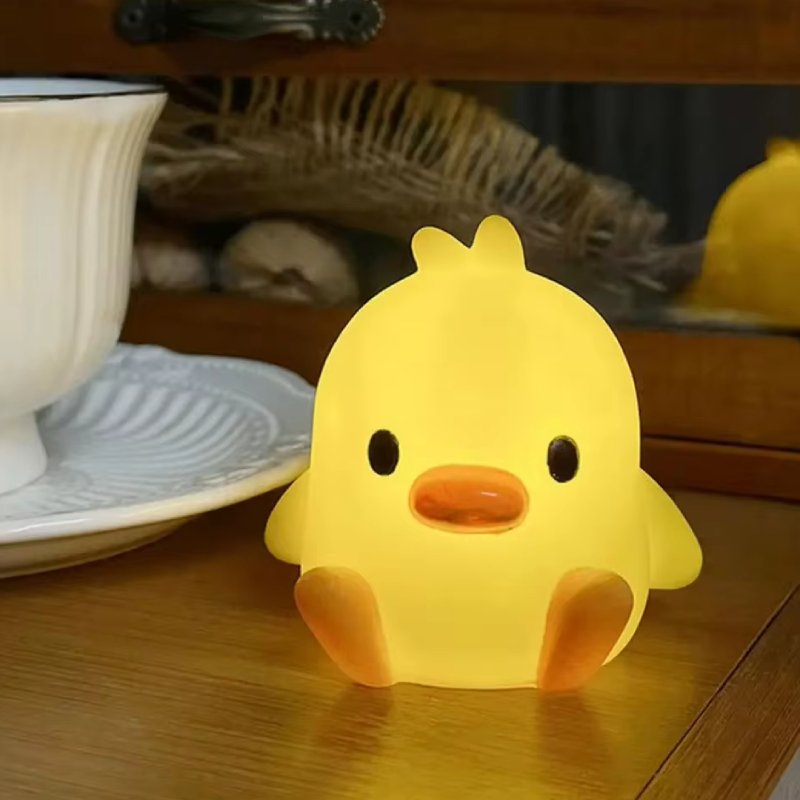 Quack & Shine Night Lamp - Adorable duck-shaped bedside night light for kids, featuring a cute cartoon design, perfect for bedroom decoration and Christmas gifts.